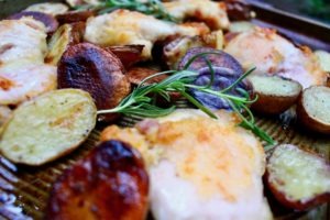 Chestnut brown crunchy chicken with crispy roasted potatoes