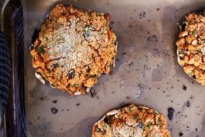 Sicilian stuffed mushrooms are mushroom caps filled with breadcrumbs, Pecorino cheese, parsley, Pine nuts and garlic, then baked until golden brown