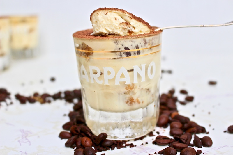 small glasses filled with Tiramisù