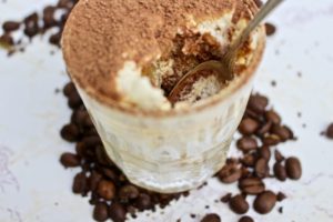small glass filled with Tiramisù