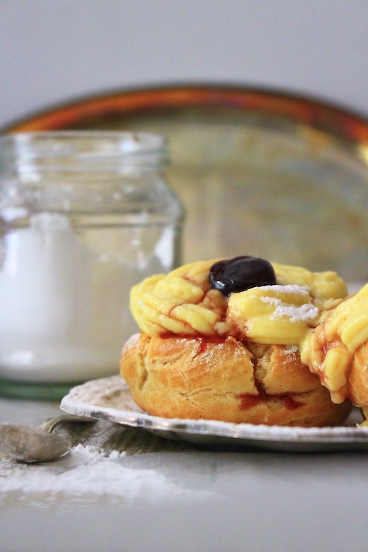 Zeppole di San Giuseppe. puff pastry filled with pastry cream and topped with an amarena cherry